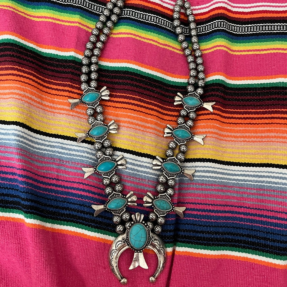 Faux turquoise squash blossom necklace